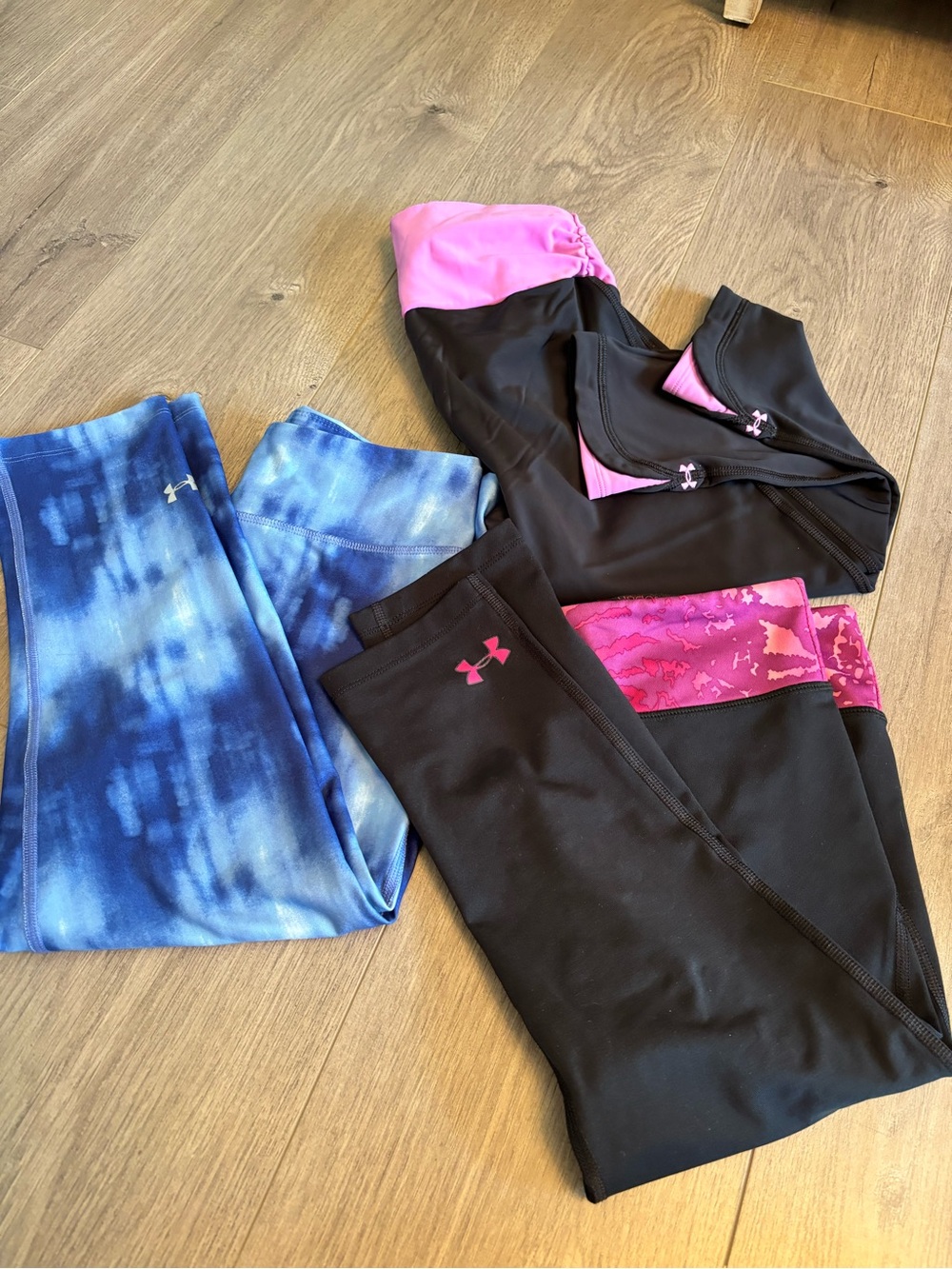 Under Armour womens Black and Pink Athletic Leggings with Blue Tie-Dye Pair